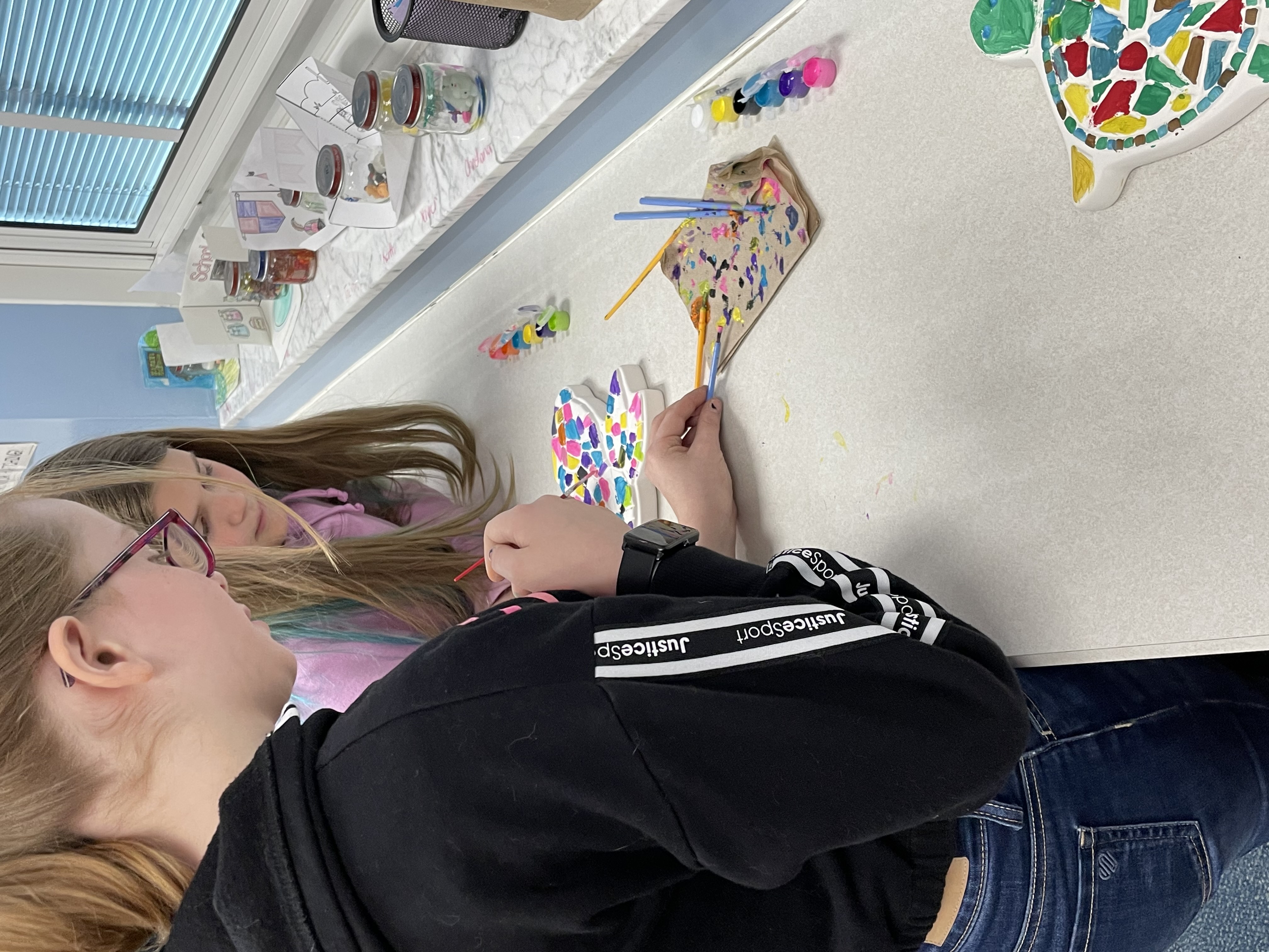 Kids eating tomatoes